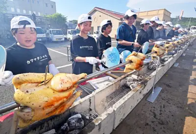 川俣シャモまつり開幕、県政150周年で150羽丸焼きに挑戦